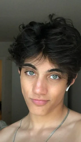 Boy With Black Hair And Green Eyes 0